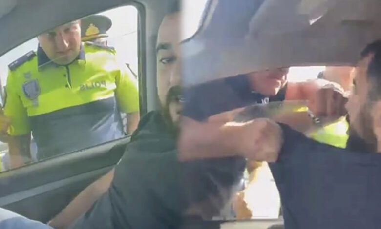 Sürücü polisin ona zor tətbiq etdiyini deyir